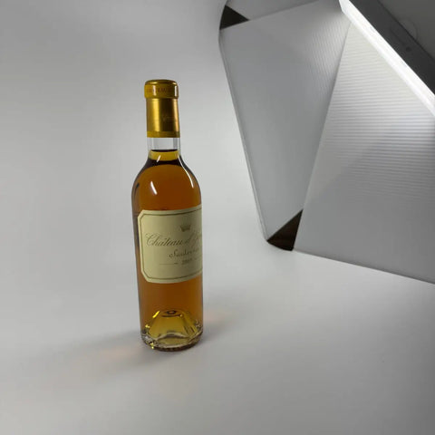 Château d'Yquem Sauternes 2009 dessert wine bottle showing golden colour and premium Bordeaux First Growth classification