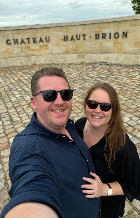 TradingGrapes co-founders Steph and Mitch at iconic Château Haut-Brion researching premium Bordeaux wines for Australian customers