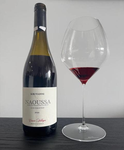 Kir-Yianni Naoussa Xinomavro 2021 Greek red wine bottle and glass showing wine colour and clarity