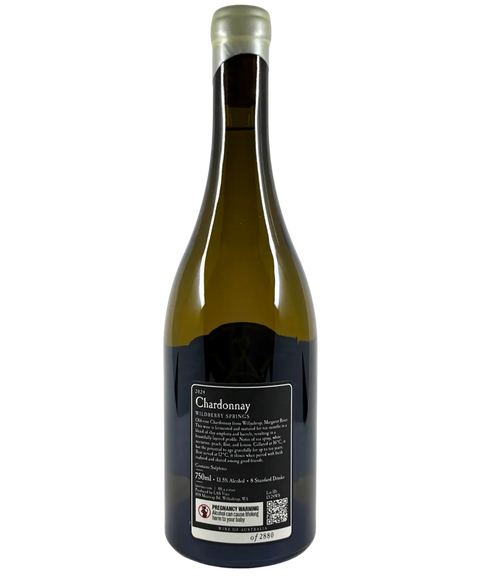Back view of LAS VINO Wildberry Springs Chardonnay 2024 wine bottle, showing tasting notes, vineyard details, alcohol content, and Australian wine regulations.