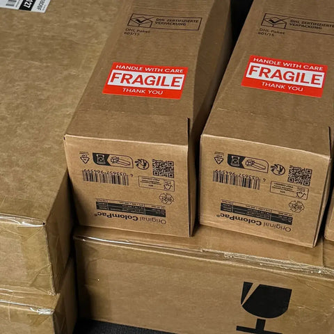 Professional wine shipping boxes with fragile labels showing secure packaging for wine delivery Australia wide