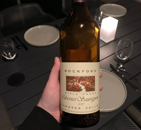 2017 Rockford Rifle Range Cabernet Sauvignon red wine bottle from Barossa Valley held in hand showing front label with vineyard illustration