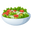Fresh green salad bowl with lettuce, tomatoes, cucumber, and olives