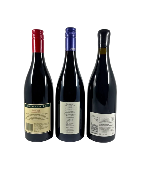 Back labels of The Cool Climate Shiraz 3-Pack – tasting notes, winery details, and origin information for Shaw + Smith Shiraz Adelaide Hills 2022, Grosset Rockwood Clare Valley Wild Shiraz 2022, and Novum Basket Press Syrah
