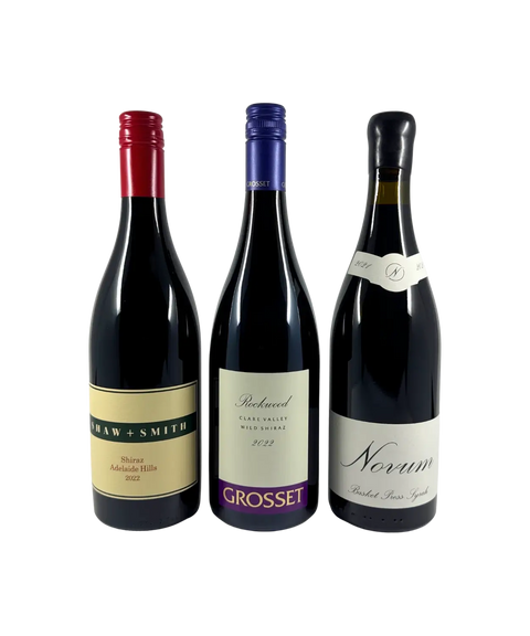 Front labels of The Cool Climate Shiraz 3-Pack – Shaw + Smith Shiraz Adelaide Hills 2022, Grosset Rockwood Clare Valley Wild Shiraz 2022, and Novum Basket Press Syrah – premium Australian red wines