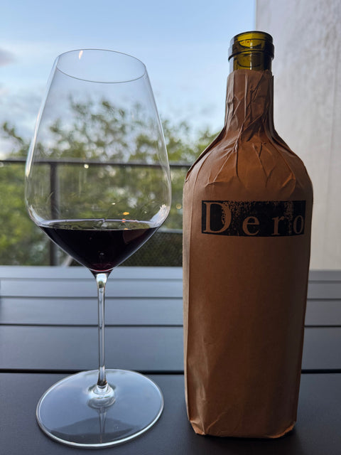 Bottle of Phase Three Wines Dero and Shiraz glass