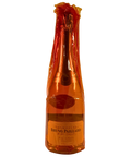 Bruno Paillard Blanc de Blancs Grand Cru Champagne bottle with orange protective cellophane wrap from Reims France