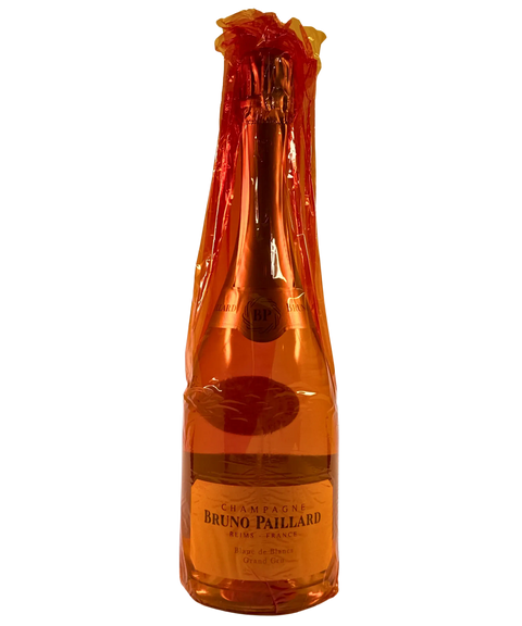 Bruno Paillard Blanc de Blancs Grand Cru Champagne bottle with orange protective cellophane wrap from Reims France