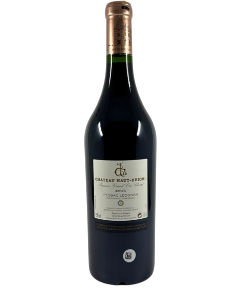 Back label of Château Haut-Brion 2015 Premier Grand Cru Classé, Pessac-Léognan Bordeaux red wine, detailing origin and bottling.