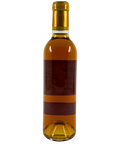 2001 Château d'Yquem Sauternes sweet dessert wine bottle back view with golden amber colour and gold foil capsule from Bordeaux France
