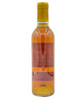 Château d'Yquem Sauternes sweet dessert wine bottle with deep golden amber color and gold foil capsule from Bordeaux France