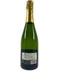 Back label of Delamotte Blanc de Blancs Brut Champagne NV – French sparkling wine with vineyard map, producer details, and gold foil