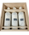 2019 Lokoya Mount Veeder wooden wine case interior showing six tissue-wrapped Cabernet Sauvignon bottles in protective compartments