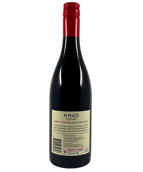 2023 MMAD Vineyard Blewitt Springs Grenache red wine bottle back label showing vineyard history and Wine of Australia designation with red capsule