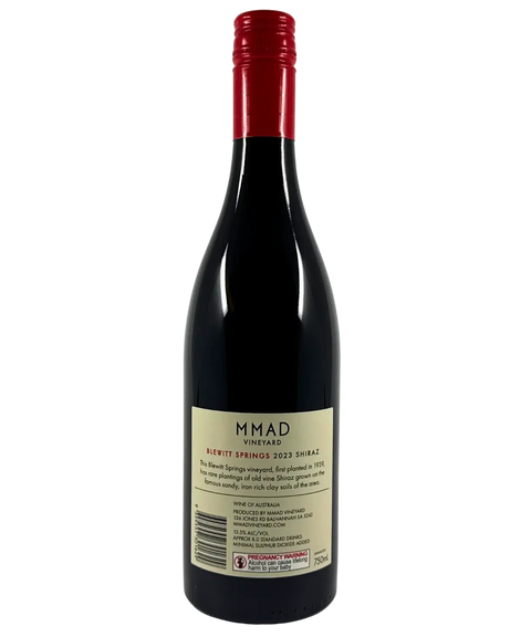 2023 MMAD Vineyard Blewitt Springs Shiraz red wine bottle back label showing vineyard history and Wine of Australia designation with red capsule