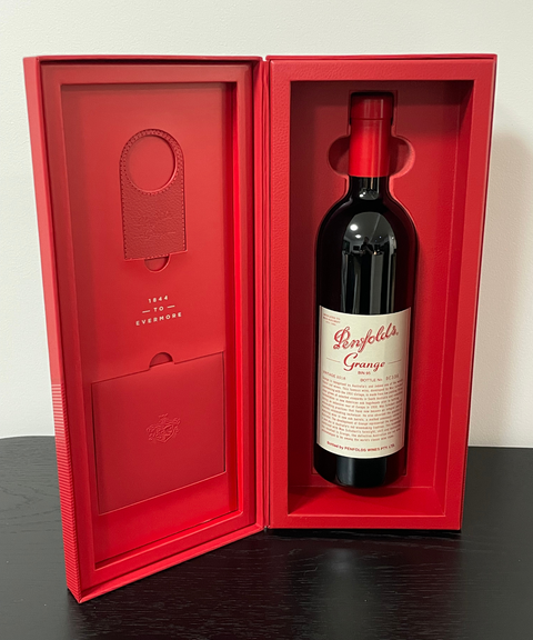 The Penfolds Grange 2018 bottle packed and presented in its original presentation box.