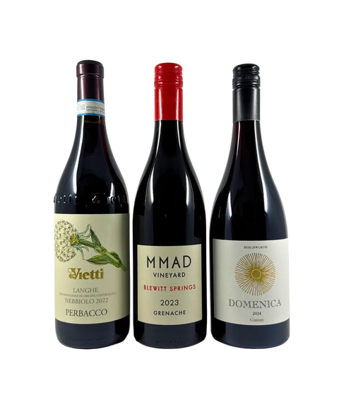 International red wine collection showing Vietti Langhe Nebbiolo 2022, MMAD Blewitt Springs Grenache 2023, and Domenica Gamay 2024