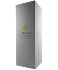 White and gold presentation box of Taittinger Comtes de Champagne Grand Cru Blanc de Blancs 2013, premium French sparkling wine packaging.