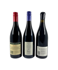 Back labels of The Cool Climate Shiraz 3-Pack – tasting notes, winery details, and origin information for Shaw + Smith Shiraz Adelaide Hills 2022, Grosset Rockwood Clare Valley Wild Shiraz 2022, and Novum Basket Press Syrah