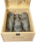 2016 Torbreck RunRig wooden wine case opened showing three tissue-wrapped red wine bottles with branded protective packaging