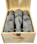 2021 Torbreck RunRig wooden wine case opened showing three tissue-wrapped red wine bottles with branded protective packaging